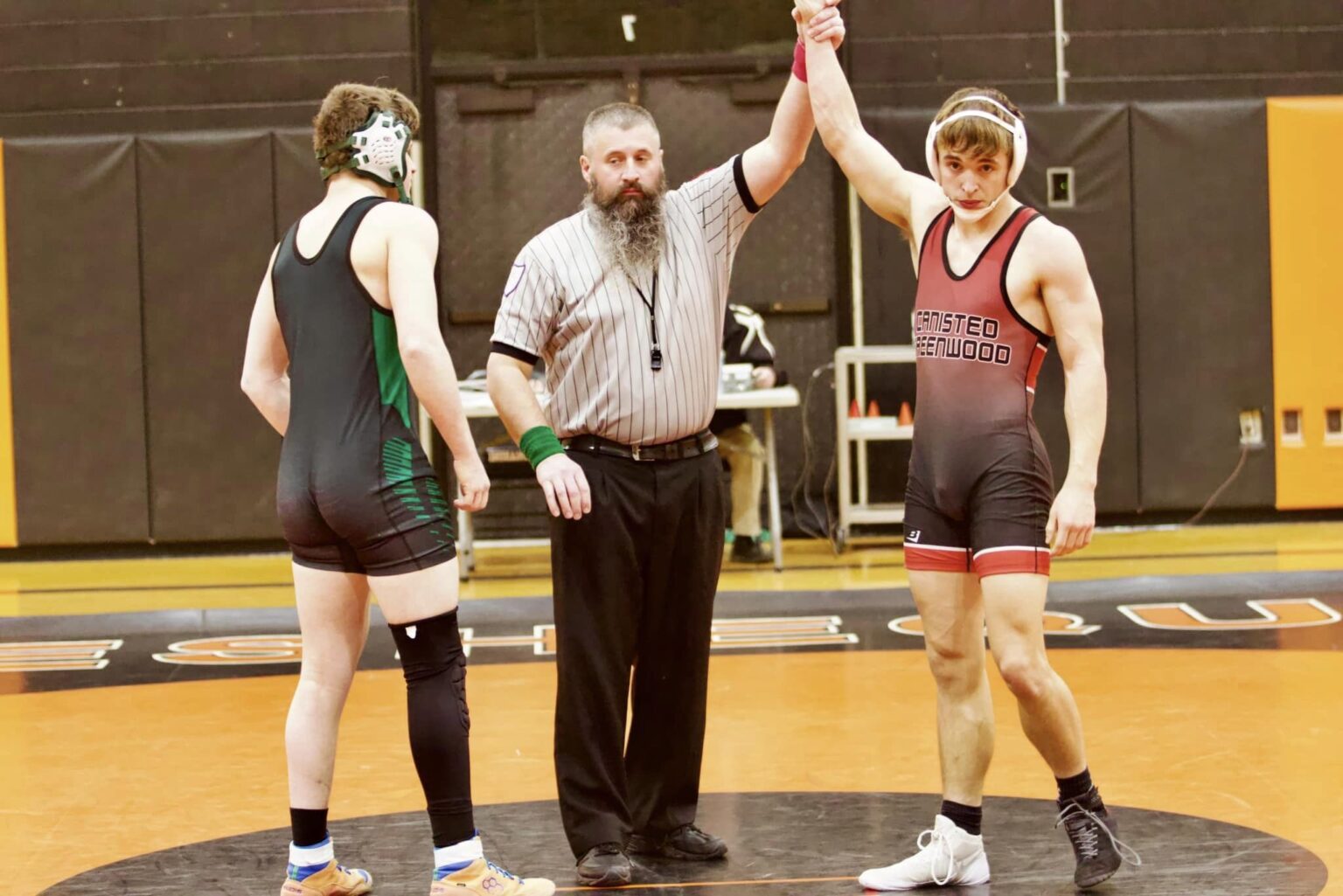 CanisteoGreenwood wrestling stronger than ever, huge 5415 win; Addison swimming downs